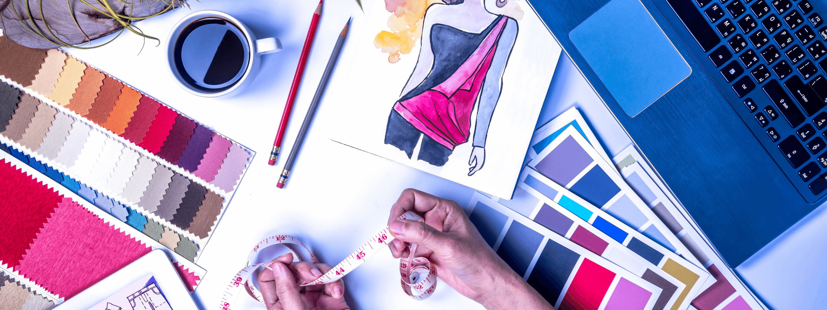Fashion Designer Working With Computer