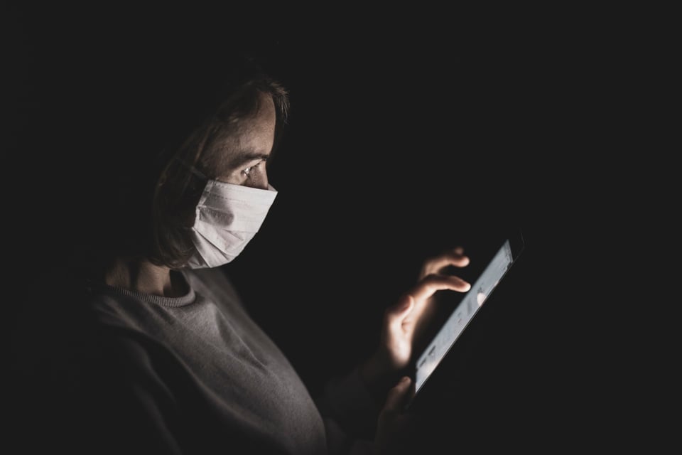 Shopping online using mobile phone while wearing mask
